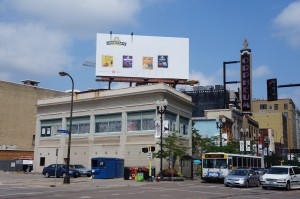 Billboard featured with Immaculate Baking logo and products above a building